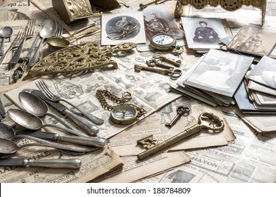 Antique Rarity Goods, Private Collection. Old Cutlery, Clock, Key, Photos. Collectibles. Shabby Chic. Selective Focus