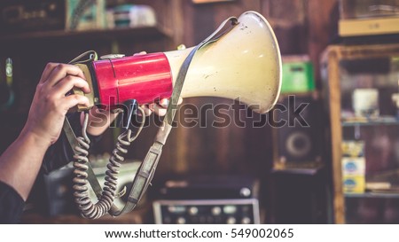 Antique red and white Megaphone. (vintage style)