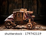Antique reproduction miniature western stagecoach wagon artisan made craft wood toy crafted by old West frontier native American Indian craftsman