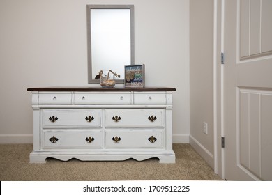 Antique restoration, white dresser with beach decor - Powered by Shutterstock