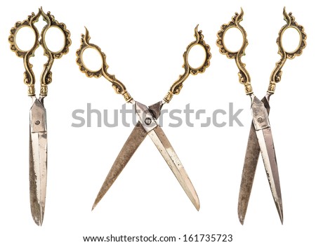antique scissors isolated on white background. vintage accessory