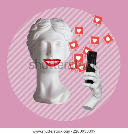 Antique smiling statue's head with red lips holding mobile phone with like symbols from social networks on pink color background. 3d trendy collage in magazine style. Contemporary art. Modern design