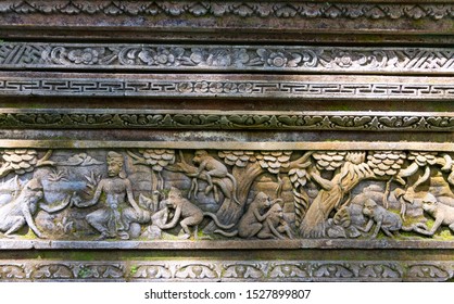 An Antique Stone Wall In The Scared Monkey Forest In Bali, Indonesia