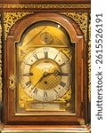 Antique table clock with walnut case