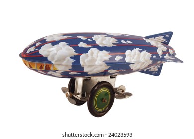 Antique Tin Toy Of A Zeppelin Or Blimp, Slightly Turned Toward The Viewer.