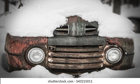 Antique Truck Buried In Snow