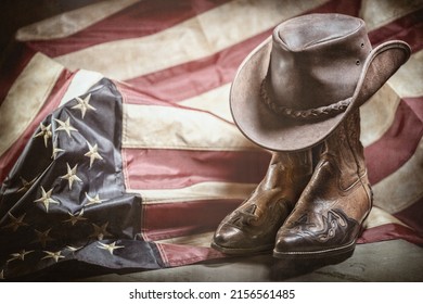 Antique vintage american flag, cowboy hat and boots, independence or memorial day concept