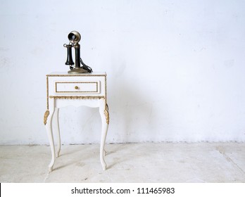 Antique, Vintage Candlestick Telephone On A  Table ,in White Room