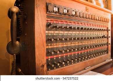 Antique vintage telephone switch board, telecomunication wood box. Old telecomunication concept.