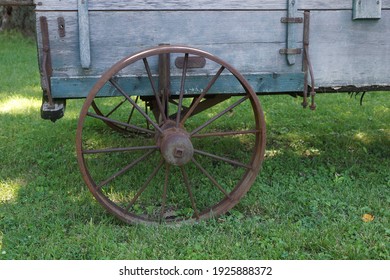 Antique wagon with rusty wheel