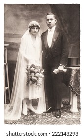 Antique Wedding Photo. Portrait Of Just Married Couple. Nostalgic Picture With Original Scratches And Film Grain