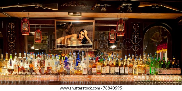 historical photo gun behind bar saloon historical photo gun behind bar saloon