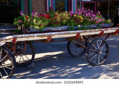 Antique wood wagon filled with fresh flowers - Powered by Shutterstock