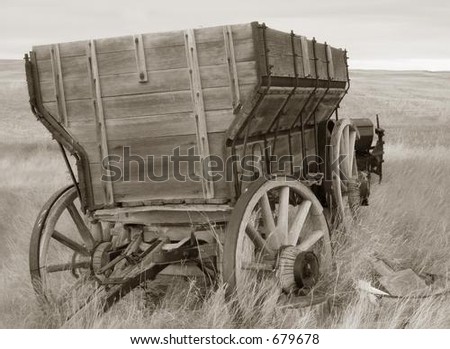 antique wood wagon in sepia tones