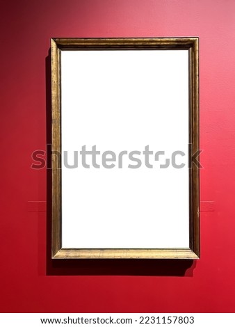 Antique wooden art fair gallery frame on the wall at auction house or museum exhibition, blank template with empty white copyspace for mockup design, artwork concept
