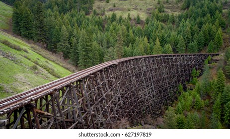 wooden train track with bridge
