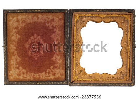 antique, worn out, clam shell photo case from nineteenth century tintype or daguerrotype portrait, red faded fabric and gold frame with floral ornaments, picture frame isolated with clipping path