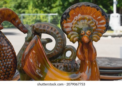 Antiques on flea market or traditional festival - vintage handmade ceramic statuette. Collectibles memorabilia and garage sale concept. Selective focus