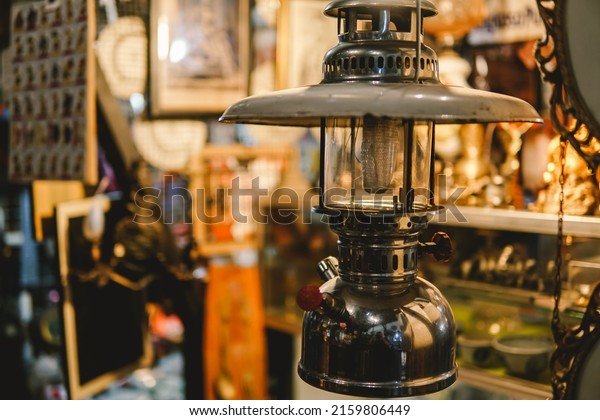 antiques in\
the vintage shop: art, toy cars, lantern lamps, sculpture,\
miniatures, old cameras, televisions, typewriter, etc. Kota Lama\
Semarang (Old Town), Indonesia antique\
store.