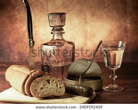 Antique-style still life with alcohol, vodka, canned fish, bread and cucumber.	
