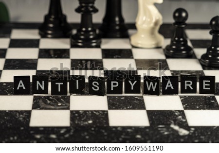 Antispyware the word or concept represented by black & white letter tiles on a chessboard