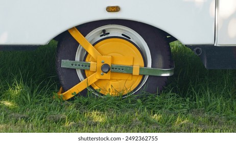 Anti-theft device on a tire on a parked caravan