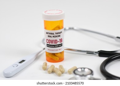 Antiviral Therapy Oral Medicine For Covid-19 Coronavirus With Pills (capsule), Thermometer, And Stethoscope.