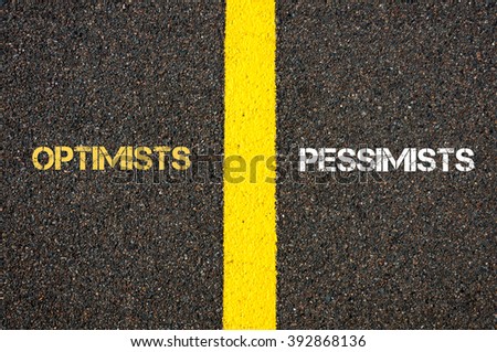 Antonym concept of OPTIMISTS versus PESSIMISTS written over tarmac, road marking yellow paint separating line between words