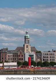 Antwerp, Belgium, 01-07-2022, Right bank of the river Scheldt in Antwerp with a view of the Saint Andrew's Church
