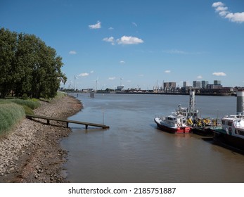 Antwerp, Belgium, 02 July 2022, Landscape photo with a view of the river Scheldt and Antwerp's right bank