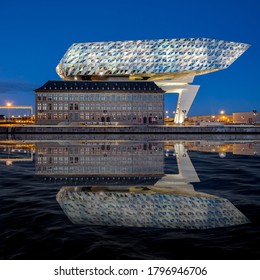 Antwerp, Belgium - 20 May 2020: The Antwerp Port House Reflected