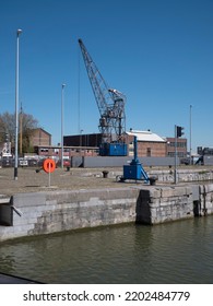 Antwerp, Belgium, April 17, 2022, Big Blue Crane At The Docks In Antwerp