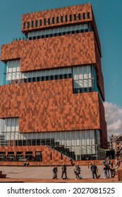 Antwerp, Belgium - August 8, 2021 - vertical view of the modern MAS (Museum aan de Stroom) in Antwerp with people