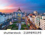 Antwerp, Belgium cityscape and plaza at dawn.