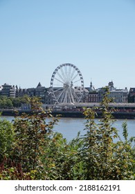 Antwerp, Belgium, July 02, 2022, the Ferris wheel and view of Antwerp's right bank from across the river Scheldt
