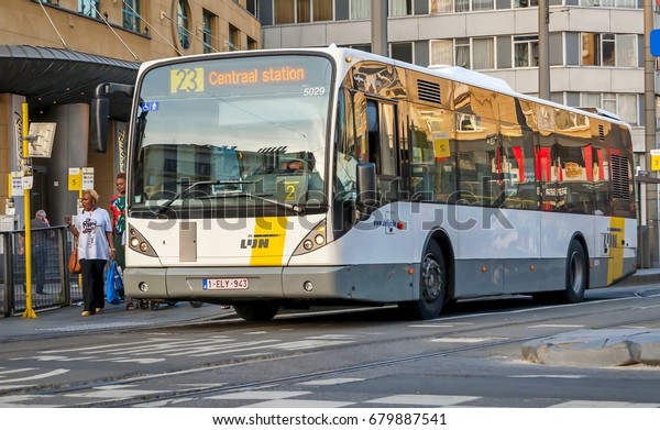 ANTWERP,\
BELGIUM. July 19, 2017. Electrical De Lijn Bus 23 arriving to the\
Antwerp central bus station. De Lijn (\