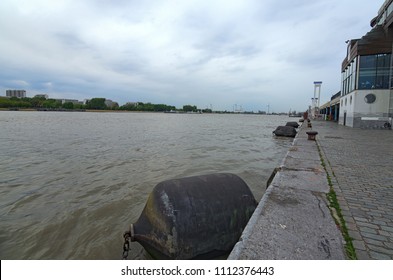 Antwerp, Belgium – MAY 02, 2018: Scheldt River Embankment In Antwerp. Spring Cloudy Day.