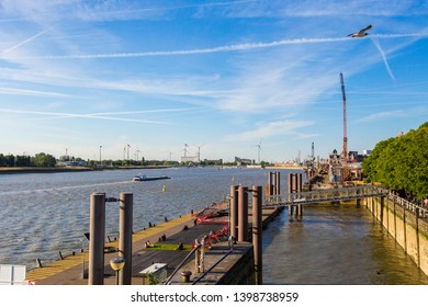 ANTWERP, BELGIUM - May 2019: Antwerp quay along the Scheldt river on sunny day, Belgium