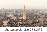 Antwerp, Belgium. Spire with the clock of the Cathedral of Our Lady (Antwerp). Historical center of Antwerp. City is located on river Scheldt (Escaut). Summer morning, Aerial View  