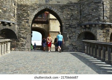 Antwerp city, Province Antwerp , Belgium - June 18, 2022: tourists entering the gate fortress "Het Steen" on a sunny morning. Het Steen castle  Antwerpen city