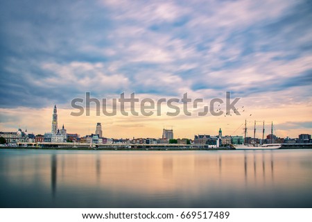 Antwerp Ship View. A cityscape with the 'Juan Sebastian de Elcano'. A training ship for the Royal Spanish Navy. It is a four-masted topsail and is the third-largest tall ship in the world.
