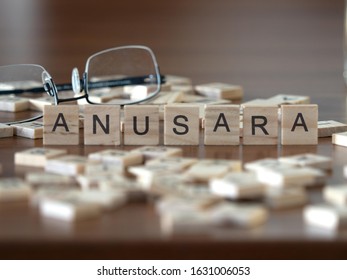 anusara yoga concept represented by wooden letter tiles