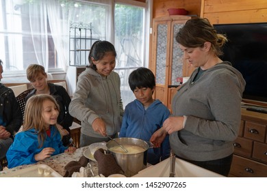 Anversa, Abruzzo / Italy -June 2 2019: Children Take Part In A Cheese Making Class On A Sheep Farm In Anversa. The Class Takes Place After Hike Which Highlights Traditional Sheep Farming Methods.