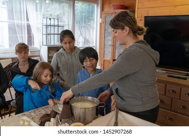 Anversa, Abruzzo / Italy -June 2 2019: Children Take Part In A Cheese Making Class On A Sheep Farm In Anversa. The Class Takes Place After Hike Which Highlights Traditional Sheep Farming Methods.