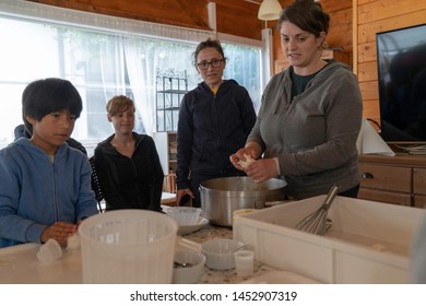 Anversa, Abruzzo / Italy -June 2 2019: Children Take Part In A Cheese Making Class On A Sheep Farm In Anversa. The Class Takes Place After Hike Which Highlights Traditional Sheep Farming Methods.