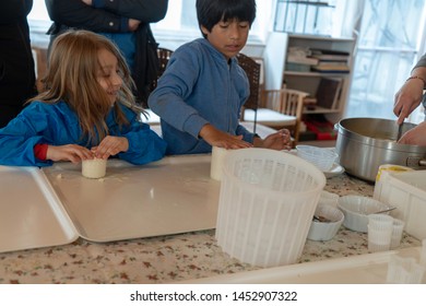 Anversa, Abruzzo / Italy -June 2 2019: Children Take Part In A Cheese Making Class On A Sheep Farm In Anversa. The Class Takes Place After Hike Which Highlights Traditional Sheep Farming Methods.