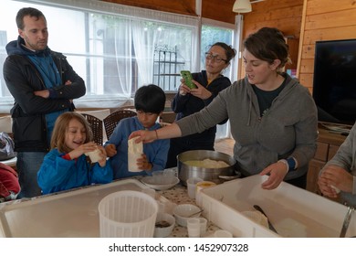 Anversa, Abruzzo / Italy -June 2 2019: Children Take Part In A Cheese Making Class On A Sheep Farm In Anversa. The Class Takes Place After Hike Which Highlights Traditional Sheep Farming Methods.