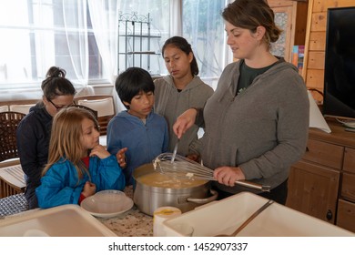 Anversa, Abruzzo / Italy -June 2 2019: Children Take Part In A Cheese Making Class On A Sheep Farm In Anversa. The Class Takes Place After Hike Which Highlights Traditional Sheep Farming Methods.