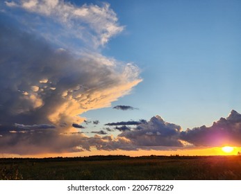 Anvil Storm Cloud With Mammatus With Wetland In Foreground 