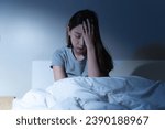 Anxiety disorder on insomnia woman concept, sleepless Woman open eye awakening on the bed at night time can